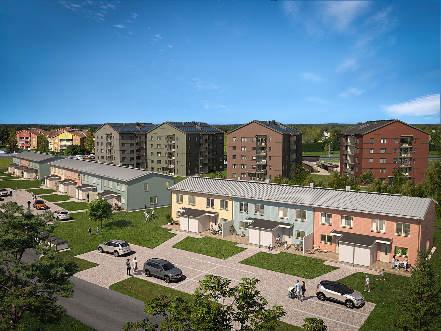 Fyra punkthus i bakgrunden och radhus framför